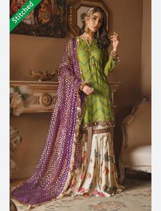 Hello beauties! Rock Your Style in Any Party with this Stylish Dress Embroidered Shirt with Silk Gharara Pants. STITCHED 3pc Luxury Designer Dress Same As Look Like Model: Only Medium Size Available Fabric Details:  Embroidered Chiffon Shirt Front Dyed Chiffon Shirt Back  Embroidered Front Daman Patti  Embroidered Chiffon Gold  Embroidered Chiffon Sleeves  Embroidered Sleeves Patti  Hand Printed Dupatta on Net with Gold Foil Printing Mts Digital Printed Raw Silk Gharara  Embroidered INSTRUCTIONS: This is original  Product. Please note that actual color may slightly vary from the colors being displayed on your device.  This could be due to your own display settings, extreme lighting during photo shoots & picture editing.  All fabrics solely belong to the brand itself.  We promise 100% genui Pista Green Sharara With Pallu For Eid, Unstitched Pista Green Designer Sharara, Pista Green Floor-length Chinon Sharara, Fitted Green Chinon Palazzo Set, Pista Green Floor-length Sharara With Dabka Work, Fitted Mirror Work Sharara For Eid, Eid Mirror Work Fitted Sharara, Anarkali Style Pista Green Sharara With Dabka, Fitted Sharara With Mirror Work For Eid