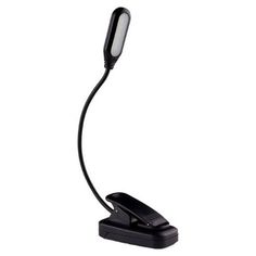 a desk lamp that is on top of a stand with a light attached to it