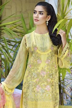 Beautiful Crinkle chiffon dress for party wear. Yellow color dress is embellished with thread embroidered crinkle chiffon shirt.Over all dress is embellished with multi color thread embroidery by giving a lavish look to outfit. Trouser: Pakistani crinkle chiffon dress is paired with raw silk trouser in matching color embellished with embroidered patches. Dupatta: Embroidered crinkle chiffon dupatta is fully embellished with thread embroidery and side embroidered borders. Detailed Description: SK Semi-stitched Gold Dress With Floral Embroidery, Designer Yellow Kurta For Spring, Embellished Georgette Kurta For Summer, Green Georgette Dresses With Floral Embroidery, Summer Anarkali Embellished Dress, Festive Yellow Embellished Kurta, Spring Designer Embellished Dresses, Pista Green Embellished Georgette Dress, Yellow Embroidered Kurta For Reception