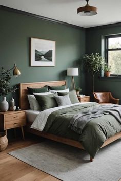 a bedroom with green walls, wooden furniture and a large bed in the middle of it