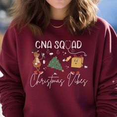 Christmas CNA Crewneck, Long Sleeve Tee or T-shirt makes the perfect holiday shirt for any Nursing Assistant!  A great gift for CNA Christmas gift! T-shirt: This is made with the Bella & Canvas 3001 classic unisex jersey short sleeve tee.  It fits like a well-loved favorite, soft cotton and quality print make users fall in love with it over and over again. These t-shirts have-ribbed knit collars to bolster shaping. The shoulders have taping for better fit over time. Dual side seams hold the garm Clinical Medical Assistant, Certified Medical Assistant, Holiday Apparel, Nursing Assistant, Medical Assistant, Holiday Shirt, Holiday Shirts, Christmas Shirt, Perfect Shirt