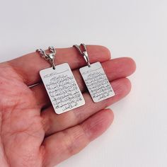 If you want to print a special text on the back of the necklace, please contact me. Please write your text on the back of the pendant. Also please note the font you want. Also, I can write any text on a blank one, and also, I can Arabic letters. Beautiful handmade Ayat- al Kursi necklace. Both necklaces and the chain made in sterling silver. Yellow model is a silver necklace with real gold plated  This is a great gift for men  This is elegant jewelry for Ramadan or fitr eid religious days.  Ayat Meaningful Engraved Rectangular Necklace, Symbolic Dog Tag Necklace As Gift, Inspirational Personalized Rectangular Jewelry, Rectangular Engraved Necklace As Gift, Rectangular Sterling Silver Necklace With Engraved Text, Sterling Silver Nameplate Jewelry With Engraved Text, Rectangular Engraved Text Necklace As Gift, Rectangular Engraved Text Necklace For Gift, Spiritual Engraved Dog Tag Jewelry