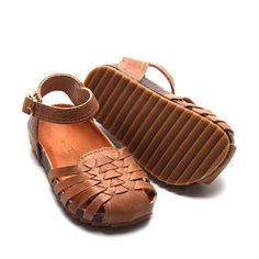 ***Looking for a smaller size? Click HERE to see this same style with smaller sizes in a soft sole.*** Elevate your summer footwear with our Camel Woven Sandals, available in US sizes 5-10. These versatile sandals are the perfect accessory, effortlessly transitioning from casual to dressy occasions. Designed with genuine leather and a sturdy hard sole, they provide the ideal combination of style, comfort, and durability. Key Features: Stylish Design: The intricate woven pattern and camel color m Slip-on Open Toe Sandals With Stitched Sole, Summer Closed Toe T-strap Sandals With Rubber Sole, Summer T-strap Sandals With Rubber Sole, Closed Toe, Casual Brown Flat T-strap Sandals, Slip-on Slingback Sandals With Round Toe For Spring, Comfortable T-strap Sandals With Round Toe For Summer, Comfortable Slip-on Sandals With Rubber Sole, Comfortable Slip-on Sandals With Textured Sole, Summer T-strap Sandals With Rubber Sole And Flat Heel