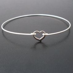 Little Heart Bangle Bracelet  Silver by FrostedWillow on Etsy, $14.95 Dainty Adjustable Open Heart Bracelet, Dainty Open Heart Adjustable Bracelet, Silver Heart Charm Bracelet For Friendship, Dainty Adjustable Heart Bangle Bracelet, Sterling Silver Bangle With Heart Charm, Heart Shaped Bangle For Valentine's Day, Adjustable Heart Pendant Bracelets For Everyday, Adjustable Open Heart Bracelet For Mother's Day, Simple Silver Jewelry For Friendship