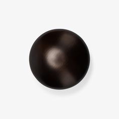 a black ball on a white background