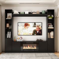 a living room with a fireplace and entertainment center