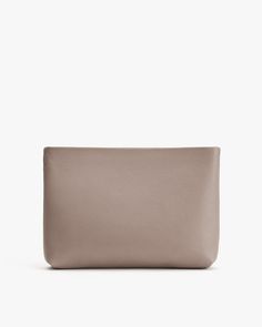 Rectangular leather pouch. Chic Clutch Pouch For On-the-go, On-the-go Laptop Sleeve Pouch Bag, On-the-go Rectangular Soft Leather Clutch, Modern Rectangular Pouch For On-the-go, Chic Bags With Zipper Pouch For On-the-go, On-the-go Clutch With Removable Pouch, Elegant Zipper Pouch Bag For On-the-go, Versatile Travel Organizer With Zipper Pouch, Everyday Soft Leather Crossbody Pouch