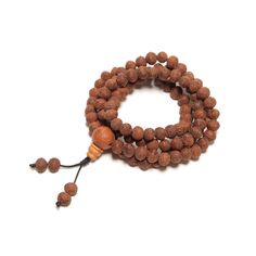 What is a 108 bead Mala? The number 108 is considered a sacred number in Hinduism, Buddhism and yogic tradition. A Tibetan mala, or Japa mala, comes in the form of a rosary of 108 beads and is used for meditation, mantras and prayers. Each pearl corresponds to the recitation of a mantra or a prayer which will be repeated 108 times. The Guru bead is the termination bead, it marks the beginning and end of the mala / chant / prayer / mantra. In Nepal, the mantra Om Mani Padme is one of the most com Tibetan Mala, Meditation Mantras, 108 Mala Beads, 108 Bead, Mala Beads, Mantra, Seeds, Meditation, Accessory Gift