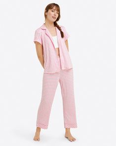 Sleep time never looked so chic. The Linda Pajama Set in Gingham is as comfortable as it is pretty. Constructed from a lush luxe knit, this fabric feels ultra soft and buttery to the touch. Designed with a relaxed fit, this two-piece set features a vibrant pink gingham print, functional buttons, and a stretchy elastic Comfortable Plaid Sleepwear For Loungewear, Plaid Relaxed Fit Sleepwear For Loungewear, Casual Gingham Cotton Sets, Casual Cotton Gingham Sets, Cozy Plaid Sleepwear Loungewear, Cozy Plaid Sleepwear For Loungewear, Cotton Gingham Loungewear Sets, Gingham Cotton Loungewear Sets, Plaid Cotton Sleepwear For Loungewear