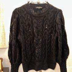 Nwot, Never Worn Sold Out Last Winter Season Size: Small Color: Black Cable Knit, With Subtle Shine From Sequins. Puff Sleeve With Ruffle Neck Snagged The Last One And As Hard As I Tried To Make It Work, This Style Neck And Sleeve Doesn’t Suit Me Winter Fitted Sweater With Balloon Sleeves, Winter Knit Sweater With Lantern Sleeves, Winter Pointelle Knit Sweater With Puff Sleeves, Fall Cable Knit Sweater With Puff Sleeves, Winter Puff Sleeve Pointelle Knit Sweater, Knit Puff Sleeve Top For Winter, Fall Chunky Knit Sweater With Puff Sleeves, Chunky Knit Puff Sleeve Sweater For Fall, Knit Sweater For Fall Party