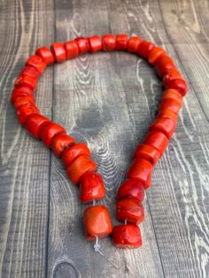 Unfinished Coral Beads Material: Gemstone Stone: Coral Shape: Unfinished Beads In a String: 36 Beads Size: 15 Inches Long string Used for: Jewelry Making, Making Necklace, Earrings & Bracelet  These items are made from original and Natural unfinished Coral. It is totally handmade. Introducing our exquisite Coral Beads - the epitome of natural beauty and elegance. These Coral Beads are not just beads; they are a canvas for your creativity, perfect for making jewelry that tells a story. Crafted fr Large Red Coral Beads For Jewelry Making, Handmade Red Coral Beads, Handmade Round Red Coral Beads, Hand-strung Red Coral Beaded Necklace For Gifts, Lapis Lazuli Crystal, Multi-strand Red Coral Necklace With Polished Beads, Special Gifts For Her, Albany Ny, Natural Coral