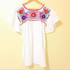 Mexican Traditional Embroidered Blouse Ethnic Boho Look Folk Art Measurements Bust: 23" Hips: 32" (Across) Handmade In Mexico Floral Embroidery Handstitched By Talented Artisans Ooak Unique In Every Piece. White Embroidered Floral Top For Summer, White Embroidered Top With Floral Print For Summer, White Embroidered Neckline Top For Summer, White Embroidered Top With Geometric Embroidery For Summer, Summer Festive Blouse With Geometric Embroidery, White Embroidered Top With Geometric Patterns For Summer, White Embroidered Festive Top For Spring, White Embroidered Top For Spring Festive Occasion, White Embroidered Blouse For Festive Occasions