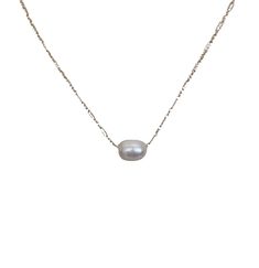 This elegant necklace showcases the timeless beauty of a single pearl delicately dangling from a dainty gold chain. The simplicity of the design highlights the natural allure of the pearl, creating a graceful and sophisticated piece. The necklace measures 16 inches in length, offering a classic and flattering fit around the neckline. Additionally, it can be adjusted to a shorter length of 15 inches, allowing you to wear it as a choker-style necklace for a more intimate and refined look. The sing Classic White Pearl Drop Chain Necklace, Classic Pearl Chain Necklace With Pearl Charm, Minimalist White Chain Necklace With Pearl Pendant, Classic Pearl Chain Necklace With Pearl Pendant, Classic Pearl White Chain Necklace With Pearl Pendant, Minimalist Single Strand Baroque Pearl Necklace, Minimalist Pearl White Pearl Chain Necklace, Delicate Baroque Pearl Necklace With Delicate Chain, Dainty White Chain Necklace With Pearl Charm