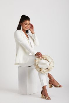 HERES TO STRONG WOMEN...
Look sharp with this classic white womans tuxedo by The Groomsman Suit. It features a beautifully tailored tuxedo jacket and tapered pants with a touch of stretch to make a statement on your wedding day... or in place of an LWD at the rehearsal dinner, bachelorette or any other bridal festivities.  

 
*Fulfilled by our friends at The Groomsman Suit
THE 411
JACKET DETAILS:

Fully-lined with single satin covered button front
Nonfunctional four-button cuffs (satin covered)