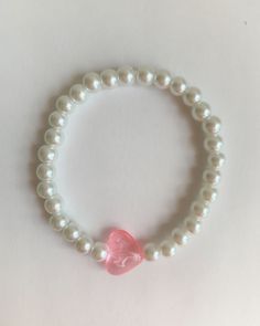 pink heart bracelet ༉ ༄ length ~ 7in ༄ price ~ $4 Trendy White Heart Charm Bracelet, Elegant Pink Beaded Bracelets With Heart Beads, Pink Crystal Bracelet For Everyday Wear, Elegant Pink Heart Beaded Bracelets, Elegant Pink Heart-shaped Beaded Bracelets, Elegant Pink Stretch Bracelet For Everyday, Pink Heart-shaped Jewelry For Friendship, Elegant Pink Heart Charm Bracelet, Trendy Pink Bracelets With Heart Beads