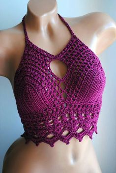 a crocheted halter top on a mannequin