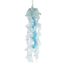 a blue and white wind chime hanging from a hook