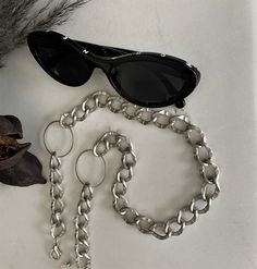 "Oversized O ring light grey glasses chain, sunglasses bold chain holder, aluminum statement chain layered necklace, chunky curb chain holder Welcome to my shop! ✈️ DHL EXPRESS SHIPPING AVAILABLE, 1-3 BUSINESS DAYS DELIVERY! ✔️ PLEASE MAKE SURE TO SELECT IT, RIGHT BEFORE YOUR PURCHASE! ❗️ ❗️ DON'T FORGET TO ADD YOUR CELL # AT THE \"NOTE TO SELLER\" SECTION IF YOU CHOOSE DHL! BY FILLING YOUR CELL NUMBER YOU EARN THE BENEFIT TO CHOOSE BETWEEN 6 DIFFERENT DELIVERY OPTIONS! INSTRUCTIONS WILL BE SENT Party Metal Glasses Chains With Adjustable Chain, Trendy Black Metal Glasses Chains, Trendy Metal Glasses Chains With Chain Strap, Trendy Metal Glasses Chain, Silver Adjustable Chain Glasses Chains, Adjustable Silver Glasses Chain With Chain Strap, Adjustable Silver Glasses Chain Fashion Accessory, Silver Adjustable Glasses Chain, Silver Adjustable Glasses Chains For Fashion