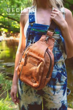 Couples might fight over this one, BEAU is a functional leather sling backpack made with the softest leather and durable strap. Suitable for him or her, BEAU boasts an outer zipper pocket perfect to secure your phone on the trek through downtown or the hiking trail. Another zipper compartment fills the rest of the bag, ideal for your water bottle and whatever else gets you through the day. BEAU is compact built with function and hands-free activities in mind. Combat Boots Heels, Leather Accessories Handmade, Felt Cowboy Hats, Hiking Adventure, Sustainable Leather, Unisex Backpack, Leather Sling Bag, Boot Jewelry, Bed Stu