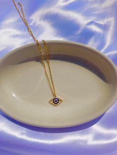 Note: Please allow all pre orders to process in 1 week. Thank you! All Pendant Necklaces And Neck Chains Start At 16inches With A Gold Extender That Adjusts Up To 24inches. The Nazar Eye Is A Protection Piece That Is Meant To Bring You Good Luck And Protect You Against Envy And Negative Energy. 🧿✨ Nazar Charm Material: 14K Gold Filled Figaro Chain Material: Stainless Steel Blue Gold Plated Chain Necklace As Gift, Gold Evil Eye Necklace As Gift, Gold Chain Necklace With Evil Eye As Gift, Gold Chain Necklace With Evil Eye For Gift, Blue Gold-plated Chain Necklace As Gift, Spiritual Evil Eye Necklace, Nazar Necklace, Adjustable Spiritual Evil Eye Necklace, Spiritual Evil Eye Metal Necklace