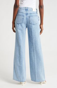 A tie at the high waist adds weekend-ready style to full-length, casual-chic wide-leg jeans made from soft, nicely draped nonstretch denim. 30 1/2" inseam; 22" leg opening; 11 1/2" front rise; 16" back rise (size 29) Tie waist Five-pocket style 60% cotton, 40% lyocell Machine wash, tumble dry Imported