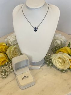 Shop our iconic 18k Silver Fateh necklace and dainty Fateh ring as a matching set. Both pieces symbolise the sikh symbol - the Khanda and are constructed from stainless steel making them lightweight, tarnish-free and water-resistant. The necklace is a unisex piece that can be adjusted to suit your style, whether that is a choker necklace or as a lengthened chain. This has a chain length of 34cm + 8cm extender so can be worn how you prefer. White Gold Polished Teardrop Pendant Jewelry, Spiritual Silver Jewelry With Diamond Cut, Silver Tarnish Resistant Necklace For Wedding, Silver Tarnish Resistant Wedding Necklace, Silver Tarnish-resistant Wedding Necklaces, Silver Tarnish-resistant Wedding Necklace, Elegant Stainless Steel Jewelry As Gift For Her, Elegant Stainless Steel Jewelry For Her, Elegant Stainless Steel Jewelry Gift For Her