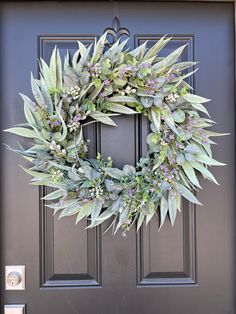 Step into a tranquil garden with our Eucalyptus and Bay Leaf Cottage Door Wreath. A delicate mix of soft lifelike lavender sprigs and lush eucalyptus leaves brings the beauty of nature to your door, evoking the feeling of a peaceful spring morning. Perfect for adding a calming touch to any space, this handcrafted wreath offers a serene escape into fresh air, blue skies, and sun-kissed days. Ideal for both indoor and covered outdoor use. Lavender Sprigs, Tranquil Garden, Fruit Wreath, Wreath Hangers, Wreath Accessories, Cottage Door, Lavender Wreath, Spring Morning, Tulip Wreath