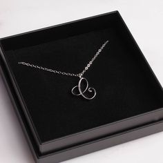 "Letter A Initial Necklace - Cursive \"C\" initial silver pendant - Personalized initial silver pendant for women / Gift for her / for mom Dainty \"C\" initial. Perfect every day necklace. Lovely gift for your self, sister, bridesmaids, new mom. Convo me if you would like to customize the length of the chain. The possibilities are endless. Pendant: Base metal is brass and silver plated. Chain is 18 inches, sterling silver. (if you would like a longer or shorter chain, please contact us to custom Mother's Day Silver Initial Pendant Necklace, Silver Minimalist Initial Pendant Necklace, Minimalist Silver Initial Pendant Necklace, Minimalist Silver Monogram Necklace, Sterling Silver Monogram Charm Necklace For Mother's Day, Mother's Day Sterling Silver Monogram Charm Necklaces, Silver Heart Pendant Initial Necklace In Sterling Silver, Silver Minimalist Initial Necklace For Mom, Silver Sterling Silver Heart Pendant Initial Necklace