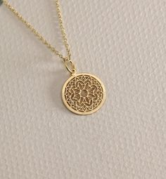 14K Real Solid Gold Mandala gold necklace ● Material of pendant: Solid Gold 14k ( REAL GOLD ) ● Metal Stamp: 14L ( REAL GOLD ) ● The pendant is available in 6 sizes: - 14,0 mm / 0,55 inches ( Diameter ) In the photos - 15,3 mm / 0.60 inches ( Diameter ) - 16,5 mm / 0,65 inches ( Diameter ) - 19,1 mm / 0,75 inches ( Diameter ) - 21 mm / 0,82 inches ( Diameter ) - 23 mm / 0.90 inches ( Diameter ) ( In the photos the size is 14mm / 0.55 inches Diameter ) ( Jump Ring inner diameter: 4 mm ) ● Materia Cheap Spiritual Yellow Gold Jewelry, 14k Gold Medallion Amulet Jewelry, Gold-plated Yellow Gold Charm Necklace With Round Pendant, Gold Plated Yellow Gold Charm Necklace With Round Pendant, Yellow Gold Plated Charm Necklace With Round Pendant, Gold Round Gold-plated Charm Necklaces, Gold Plated Round Charm Necklaces, Gold-tone 14k Gold Filled Necklaces, Gold-tone 14k Gold Filled Necklace