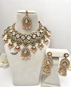 Premium quality Kundan Necklace comes with elegant Jhumki Earrings and Tikka/ Indian Jewelry/Premium Quality Polki and Kundan Jewelry/pink      All items are shipped from Brampton, Ontario, Canada. If you need your item by a certain day, please reach out to us for express delivery option before placing the order so that we can update the shipping for you. Standard shipping/delivery timeline Below are the delivery timeline estimates. We dispatch all orders by the next business day. ---> USA deliv Pink Hand Set Bridal Earrings For Wedding, Pink Hand-set Bridal Earrings For Wedding, Pink Bridal Sets For Festive Occasion Gift, Pink Bridal Sets For Festive Gift, Pink Bridal Sets For Festive Occasion, Festive Pink Bridal Sets As A Gift, Pink Stone Work Bridal Earrings For Wedding, Pink Bridal Sets For Festive Celebration, Pink Round Kundan Necklace For Diwali