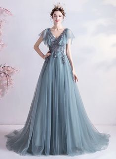 Blue v neck tulle lace ball gown dress formal dressSilhouette: A lineMaterial: tulle, laceBack details: lace upHemline: floor lengthCustom made size:Custom made: For custom order, we need the following information in the order notes when you check out :&ltp&gtBust:______</p>&ltbr/>&ltp&gtWaist:______</p>&ltbr/>&ltp&gtHip:_______</p>&ltbr/>&ltp&gtShoulder to floor: _______</p>&ltbr/>&ltp>(Processing time: 16 business days) (Shipping Time: 3-7 business days)</p>&ltbr/> Lace V-neck Gown For Prom, V-neck Tulle Ball Gown For Formal Occasions, Evening V-neck Tulle Ball Gown, V-neck Tulle Ball Gown For Evening, Evening Tulle Ball Gown With V-neck, Tulle V-neck Gown For Debutante Ball, V-neck Tulle Gown For Debutante Ball, V-neck Tulle Evening Dress For Wedding, Elegant Tulle V-neck Gown