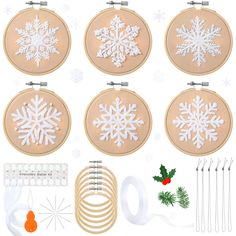 embroidery kit with snowflakes and other items to make it look like christmas decorations