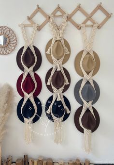 Introducing our exquisite macrame cowboy hat hangers, meticulously crafted using the art of macrame. These unique wall hat holders are available in 1 tier, 2 tiers, and 3 tiers, offering you flexibility to showcase your hat collection in style. With a wide selection of 19 vibrant colors to choose from, you can easily find the perfect match for your decor. Each macrame hat hanger exudes a bohemian charm, adding a touch of free-spirited elegance to any space. Not only do they serve as practical st Macrame Baskets, Macrame Hat Holder, Cowboy Hat Summer, Macrame Hat Hanger, Macrame Hat, Hat Organizer, Wood Hooks, Wall Hats, Hat Holder