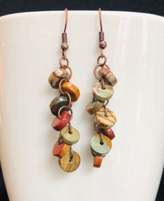 Picasso Jasper Copper Earrings - Boho Style earrings in earthy tones. Each pair is made individually, and each bead is unique! All pairs are different and may appear different than photo. Enjoy the true uniqueness of these beautiful Picasso Jasper Earrings! Adjustable Earthy Dangle Earrings, Earthy Dangle Earrings With Ear Wire, Earthy Handmade Dangle Earrings, Multicolor Earthy Dangle Earrings, Earthy Multicolor Dangle Earrings, Artisan Brown Beaded Earrings For Pierced Ears, Earthy Handmade Multicolor Earrings, Brown Earrings With Dangling Beads, Earthy Brown Earrings With Dangling Beads