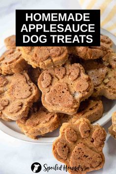 homemade applesauce dog treats on a white plate with the title overlay reading homemade apple sauce dog treats