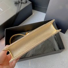 Size: 19cm*11.5cm*4cm It comes with Dust box, Care manual, Tag, and Paper bag. Luxury Rectangular Baguette Bag With Top Carry Handle, Luxury Rectangular Baguette Bag With Dust Bag, High-end Daily Use Pouch Box Bag, Handheld Shoulder Bag With Original Box As Gift, High-end Box Bag With Gold-tone Hardware, High-end Gold-tone Pouch Box Bag, Designer Rectangular Baguette Bag With Detachable Handle, High-end Rectangular Shoulder Bag, High-end Pouch Bag For Gift