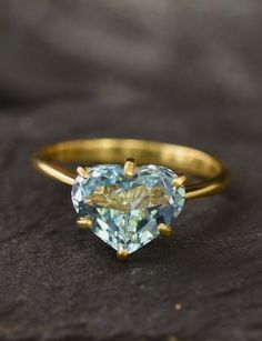 Heart Shaped Aquamarine Gemstone Ring / 14k Yellow Gold Ring / Best Valentine Gift For Girlfriend / Gold Gemstone Ring / Handmade Gold Ring by Shomilijewellers Details :- Handmade Item Material :- 14k Yellow Gold Gemstone :- Aquamarine  Ring Size: 7 US and we can make ring size as per your requirement size. 14k Gold Heart-shaped Proposal Jewelry, Gold Gemstone Crystal Proposal Ring, Gold Crystal Proposal Ring With Gemstone, Gold Crystal Proposal Ring, Gold Heart Ring With Gemstone, Gold Heart Ring With Oval Gemstone, Heart Cut Topaz Gemstone Ring For Promise, Heart Cut Topaz Ring For Promise, 14k Gold Heart Cut Jewelry With Center Stone