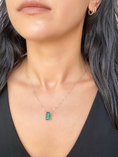 This elegant, timeless necklace features a stunning 3.76ct rich green Zambian emerald that is the focal point of the design. The emerald is set into a classic prong design that can be worn vertically or horizontally on the chain to suit any occasion. With this necklace, you can easily transition from a day in the office to a night on the town. ♥ The pendant measures 7mm in width, 13mm in length, and is 5.5mm thick. ♥ The necklace chain shown is included and measures 17.5" with a slider bead that Emerald Pendant Necklace, Gold Pendant Set, Timeless Necklace, Emerald Necklace Pendant, Zambian Emerald, Halo Pendant, Emerald Pendant, Rich Green, Dramatic Look