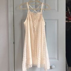 New With Tags! I Purchased This From Another Posher And It Doesn't Fit As I Want It To. The Dress Is Beautiful With Detailed Off White Lace And Croquet. Crossed Spaghetti Straps. Higher On The Sides Than Middle At The Bottom Hem. Built In Slip As Seen. Feel Free To Make An Offer Or Ask Any Questions! Measurements: About 33.5 In Length (Top Of Strap To Bottom) Armpit To Bottom Is 22in Delicate, Vintage Look, Layer, Summer, Beach, Boho, Bohemian, Hippie, Coachella, Woodstock Summer Lace Mini Dress With Crochet Trim, Casual Lace Dress For Day Out, Lace Crochet Trim Sundress, Lace Crochet Sundress With Crochet Trim, Spring Day Out Dresses With Crochet Lace, Lace Mini Dress With Crochet Trim For Vacation, Spring Day-out Dresses With Crochet Lace, Spring Dresses With Crochet Lace For Day Out, Lace Crochet Dress With Lace Trim For Day Out