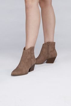 These booties are designed with a Western-inspired aesthetic, featuring classic details such as pointed toes, decorative stitching, and a stacked heel. They are typically ankle-high, making them suitable for various outfits, from jeans and dresses to skirts and shorts. The pointed toe adds a touch of sophistication, while the stacked heel offers comfort for extended wear. Style: Casual Silhouette: Booties Embellishment: NA Length: NA Closure: Zipper Heel Height: 3" Width: NA Made In: ChinaCare I Junior Hoodies, Knee High Heels, Inspired Aesthetic, Zipper Heels, High Heel Boots Knee, Western Booties, Decorative Stitching, Dress Rings, And Dresses