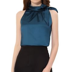 The classic silky satin fabric in the solid color, a mock neck with a cute side bow, and a sleeveless design add fashion elements and feminine charm to this versatile tank top. This sleeveless satin blouse matches jeans, flared skirts, work pants, wide-leg trousers, and office-style pants or shorts perfectly. Occasion: Suitable for summer, fall, winter, dating, picnic, work, office, shopping, weekend, home and daily wear. Weekend Home, Elegant Work Outfits, Flared Skirts, Jeans Flared, 2piece Outfits, Fashion Elements, The Office Shirts, Blouse Sleeveless, Satin Blouse