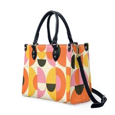 • Elevate your style with our retro style 60s Space Age Opt Art Handbag, a chic fusion of mod and vintage aesthetics inspired by the iconic designs of the 60s.• This Mod 60s Handbag features a mesmerizing geometric opt art pattern print in vibrant shades of orange, pink, yellow, and black, adding a bold and artistic touch to any outfit.• Crafted from premium PU leather, this Retro Handbag Women boasts an exquisite zipper closure and comes with a removable strap for added versatility.• Available in three sizes - small, medium, and large - and with two handle options in black and white, this 60s Style Handbag offers both style and practicality for every occasion.**Designed in California by Trendy Hip Buys. Made to order from overseas. 60s Space Age, Opt Art, Vintage Inspired Shoes, Orange Handbag, Vintage Style Hat, Retro Handbags, Mod 60s, Men's Vintage Style, Everyday Handbag