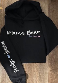 Personalized Mama Bear hoodie with name (s) on arm. Perfect for Mother's Day, Valentine's Day, etc.  Care Instructions - To keep your products in great condition, we recommend washing them inside out with similar colors on cold rinse. - Please use non-chlorine bleach only and tumble dry at a low setting. - Ironing is safe at a medium temperature, but please avoid ironing directly on the decoration. - Dry cleaning is not necessary. Casual Personalized Hooded Hoodie, Casual Hoodie With Name Print, Casual Fall Hoodie With Name Print, Casual Personalized Crew Neck Hoodie, Casual Hoodie With Name Print For Winter, Cotton Hooded Sweatshirt For Mother's Day, Casual Crew Neck Hoodie With Personalization, Casual Crew Neck Hoodie With Personalized Details, Casual Hooded Sweatshirt With Name Print