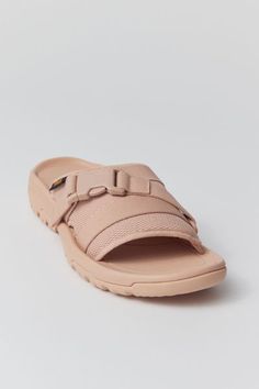 Teva's slide sandal with soft molded topsole and rugged outsole for varied terrain. Adjustable hook and loop straps offer a customizable fit while supportive + structured build is perfect for long walks or hikes. Content + Care. Rubber Spot clean Imported Maple Sugar, Sugar Maple, Long Walks, Hook And Loop, Slide Sandals, Urban Outfitters, Sandals