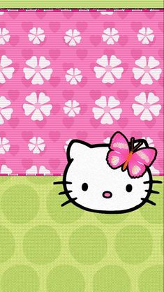 the hello kitty wallpaper is pink and green with white flowers on it's side