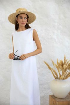 Linen maxi dress with boat neck and open back for women with feminine look. Made from washed linen to prevent shrinkage after washing. Completely organic and hypoallergenic. • All clothing made from washed European blend linen (60% linen and 40% cotton) • OEKO-TEX certified fabric (no harmful chemicals used in production) • Maxi length • Boat neck • Open back with ties • Double layer top (bust) • From XS to Plus size • Perfect clothing for summer Summer Beach A-line Linen Dress, White Sleeveless Linen Dress For Day Out, Elegant A-line Linen Beach Dress, Chic Sleeveless Unlined Linen Dress, White Linen Sleeveless Dress For Beach, Linen A-line Maxi Dress For Beach, Summer Linen A-line Dress For Beach, Summer Beach Linen A-line Dress, White Sleeveless Linen Dress For Vacation