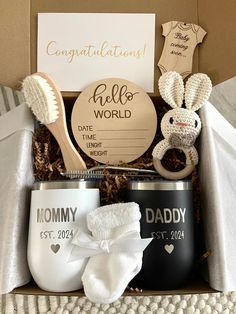 a baby gift box with personalized items in it