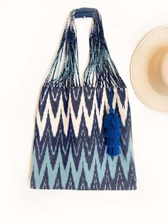 A stylish tote bag that has plenty of room to hold everything you need for a day at the beach, the farmer's market or as everyday tote. From your towel to sunscreen and wallet, you can carry all of your beach essentials. This bag is crafted from textured cotton canvas fabric. These bags are handwoven by skilled artisans in Momostenango, Guatemala on traditional backstrap looms. Madre Luna recognizes the importance of heritage, high quality and craftsmanship. We partner with cooperatives, small a Rectangular Woven Canvas Bag For Summer, Summer Cotton Canvas Bag For Vacation, Bohemian Bags For Everyday Summer Use, Summer Cotton Canvas Bag, Natural Canvas Bag For Vacation, Rectangular Natural Canvas Bag For Vacation, Summer Travel Woven Canvas Bag, Woven Canvas Travel Bag For Summer, Bohemian Summer Bag With Double Handle