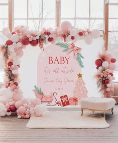 a baby shower with balloons and decorations