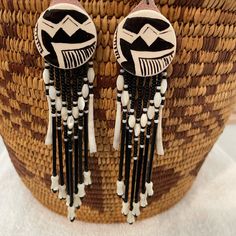 Beautiful Vintage Native American Navajo Made Earrings. All Handmade. Total Length Is 5” With The Pottery Measuring 1 1/4”. Vintage 1979. In Excellent Condition. Check Out My Other Navajo Jewelry. Southwestern Style White Jewelry With Dangling Beads, Southwestern White Dangle Jewelry, Southwestern Style White Earrings For Festivals, Southwestern Style White Dangle Jewelry, Southwestern Style Handwoven Dangle Jewelry, White Southwestern Handwoven Jewelry, Artisan White Handwoven Jewelry, Black Bohemian Hand-tooled Jewelry, Handmade Southwestern White Earrings